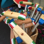 polo mallets in a basket