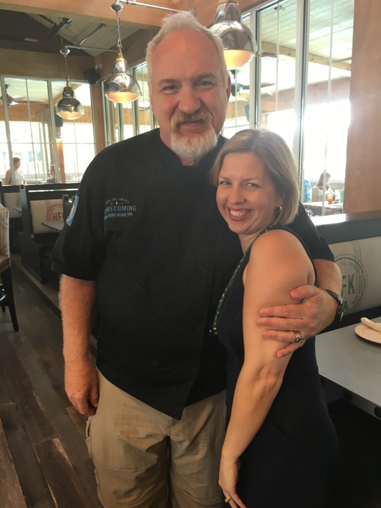 chef art smith hugging Kimberly button at Homecoming restaurant at Disney Springs