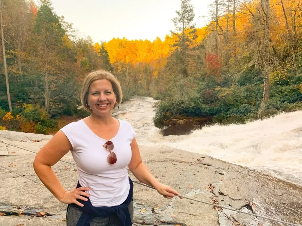 woman standing on waterfall Dupont state forest