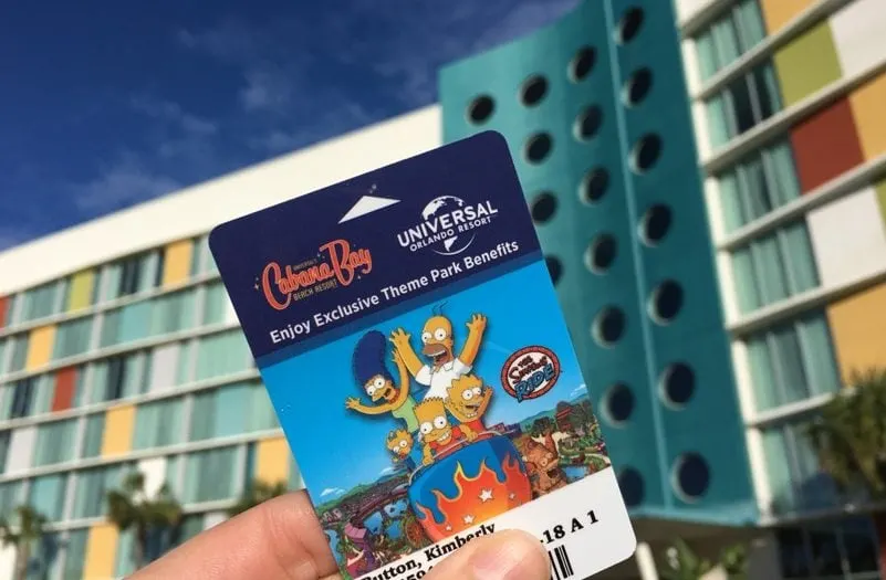 holding a Universal Studios Hotel key card