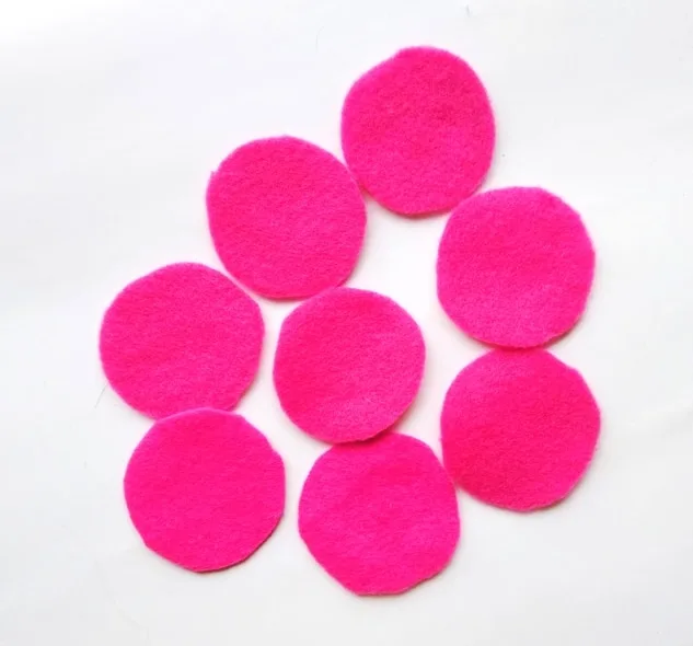 eight pink felt circles 