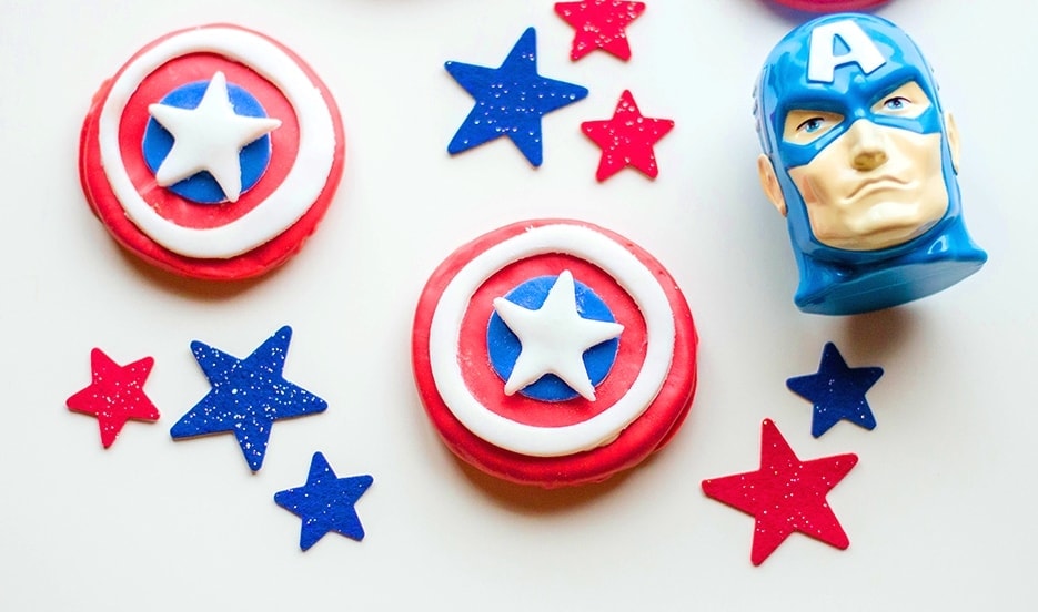 red cookies with white and blue circles white star on white table