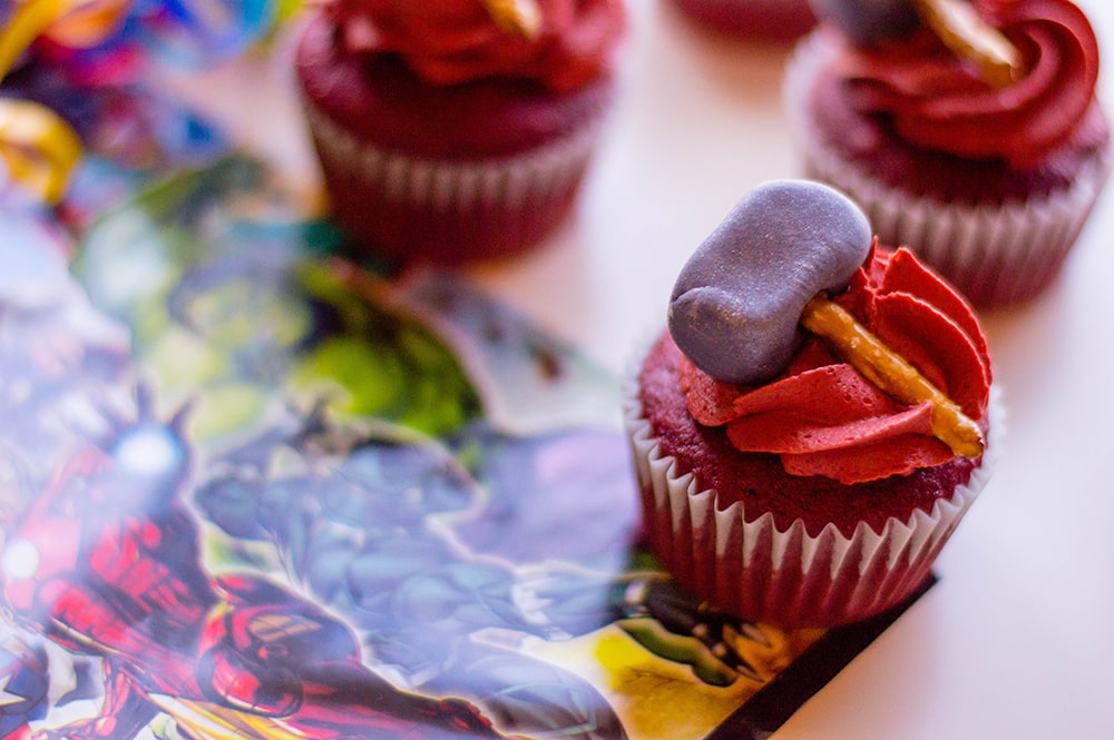 red velvet cupcakes with red frosting and hammers