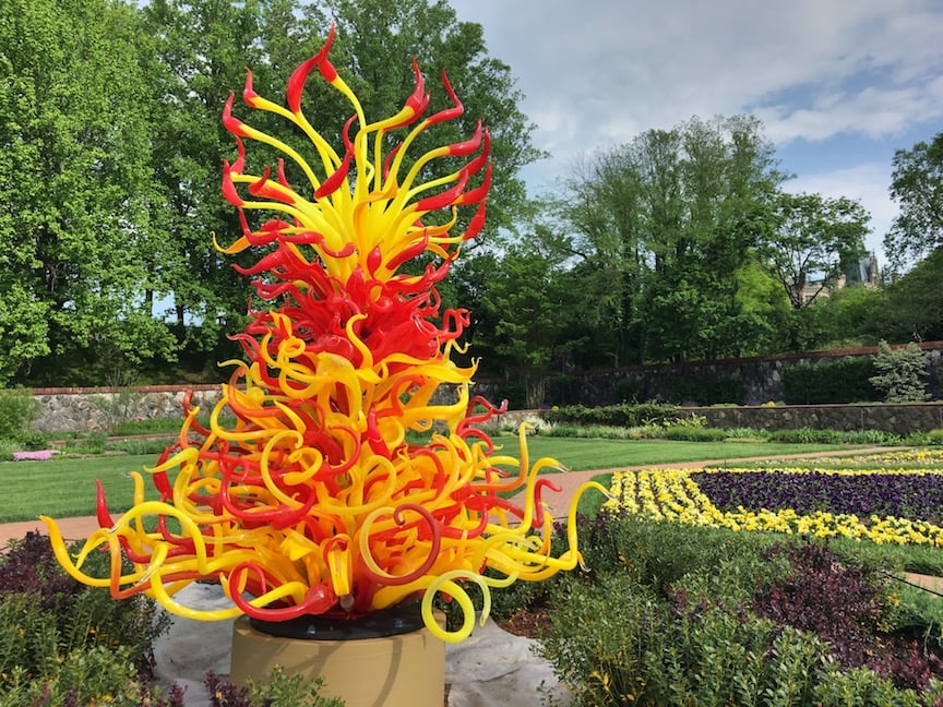red and yellow glass sculpture in Biltmore Estate walled gardens