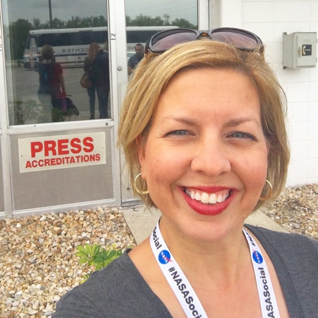 Kim at NASA Social in front of Press Accreditation