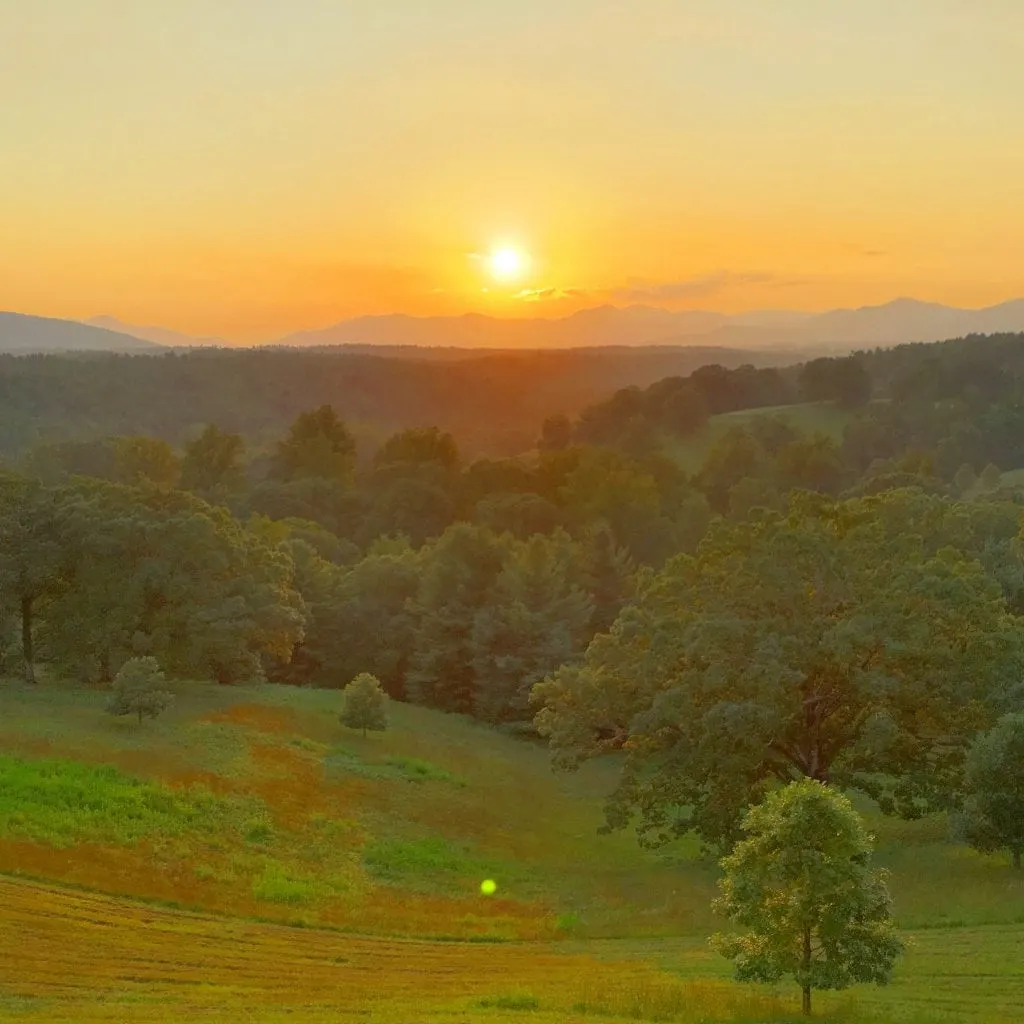 sunset behind the Blue Ridge Mountains at Biltmore Estate