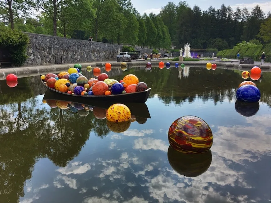 Chihuly glass balls in pond at Biltmore estate
