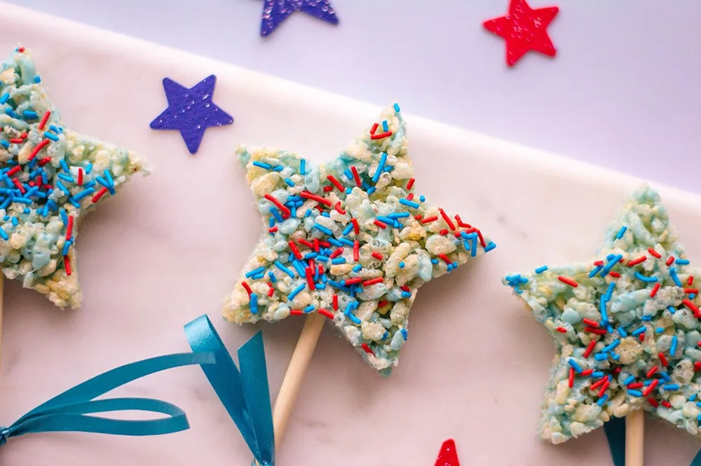star shape red white and blue rice krispies treat on a stick