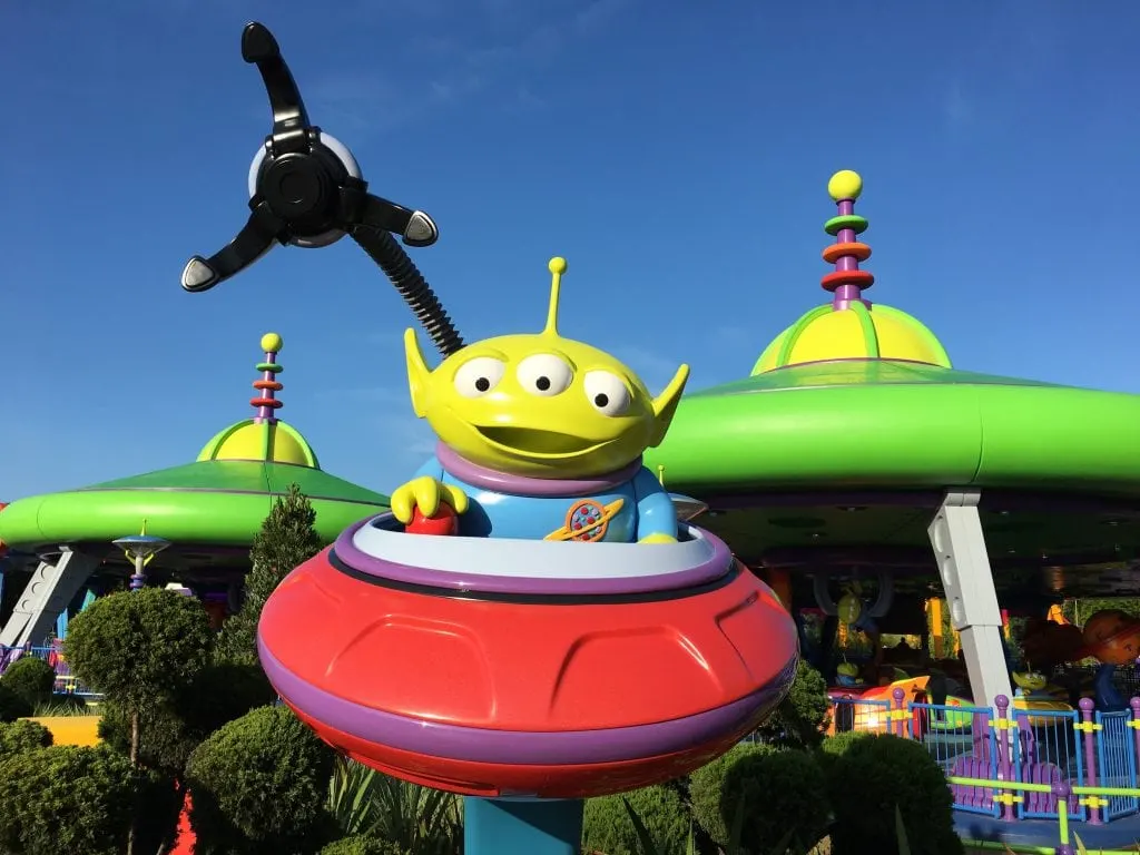bright green alien in spaceship Toy Story Land