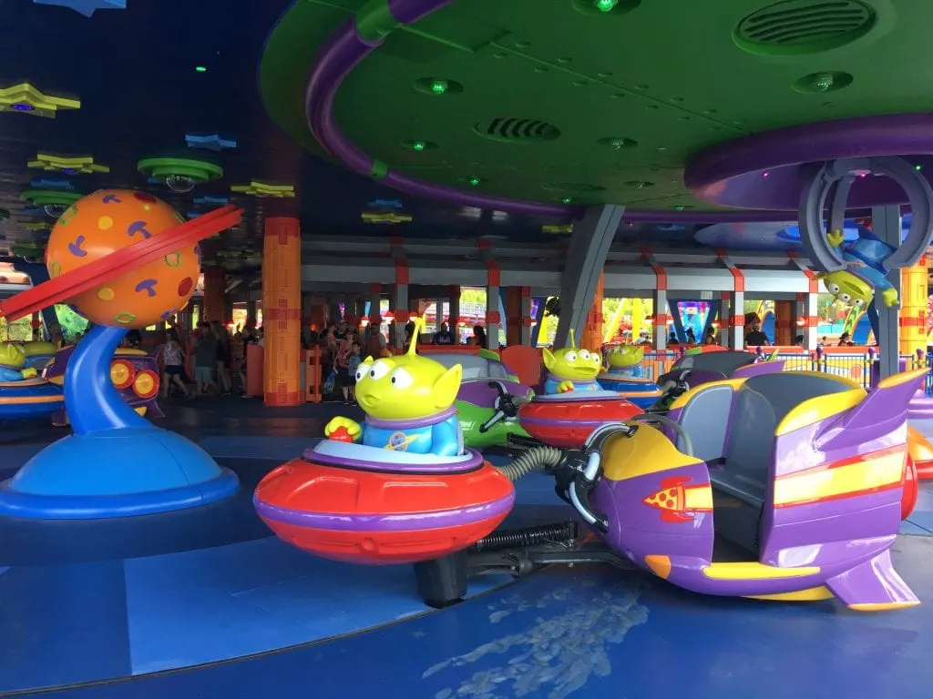 alien swirling saucers ride toy story land
