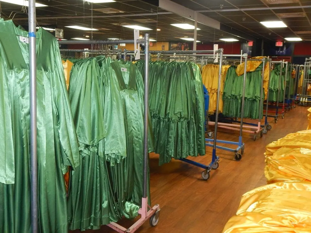 choir robes hanging on clothes racks
