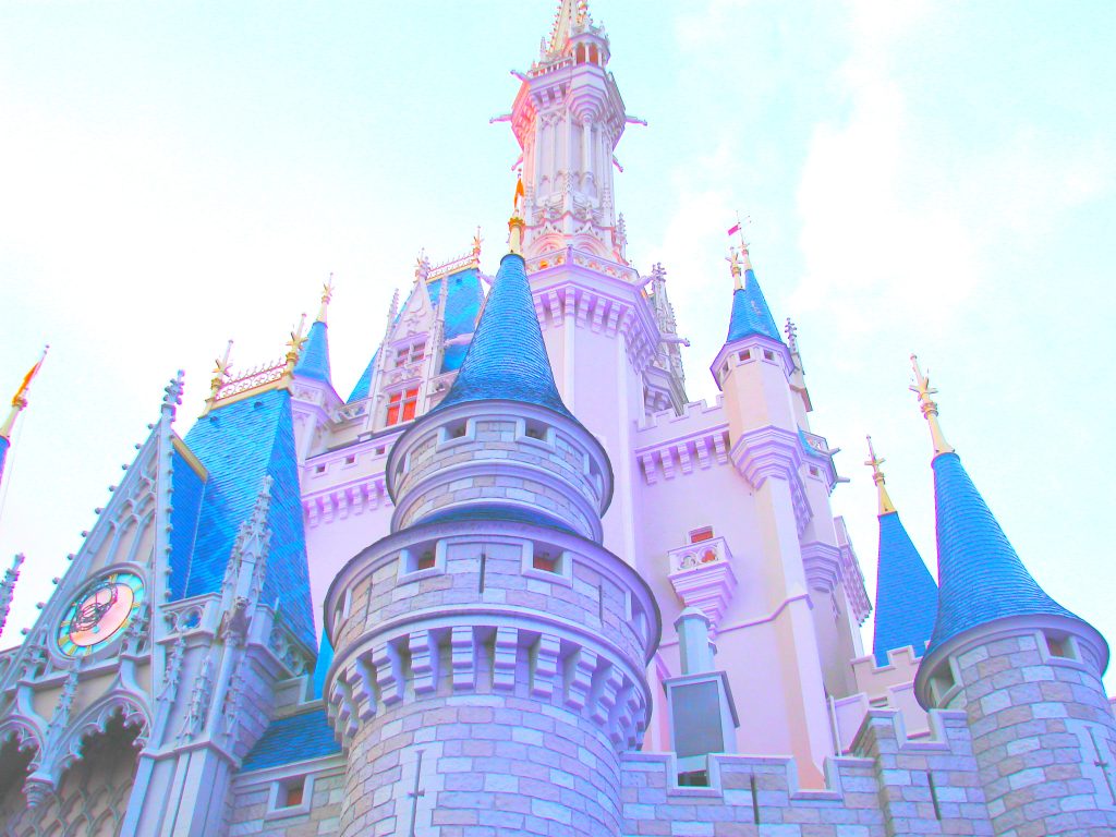 Disney castle against blue sky