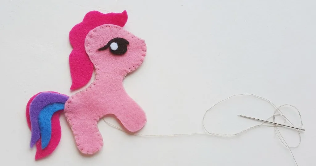 DIY My Little Pony Felt Craft pieces being sewn together with needle and thread
