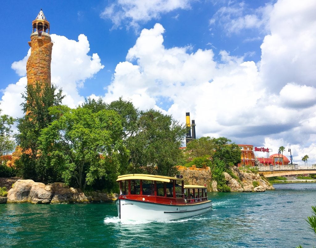 boat in water in front of Universal Studios Orlando