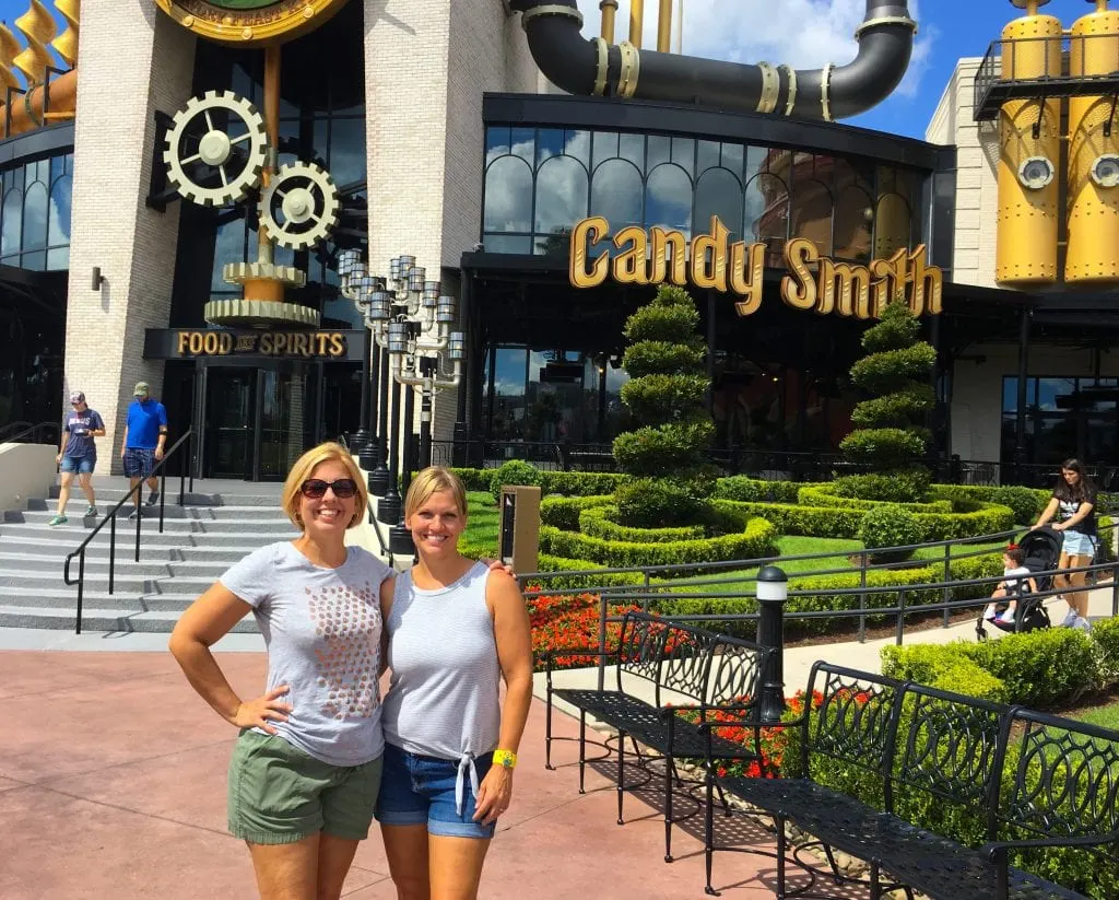 two women outside of toothsome chocolate emporium universal city walk dining