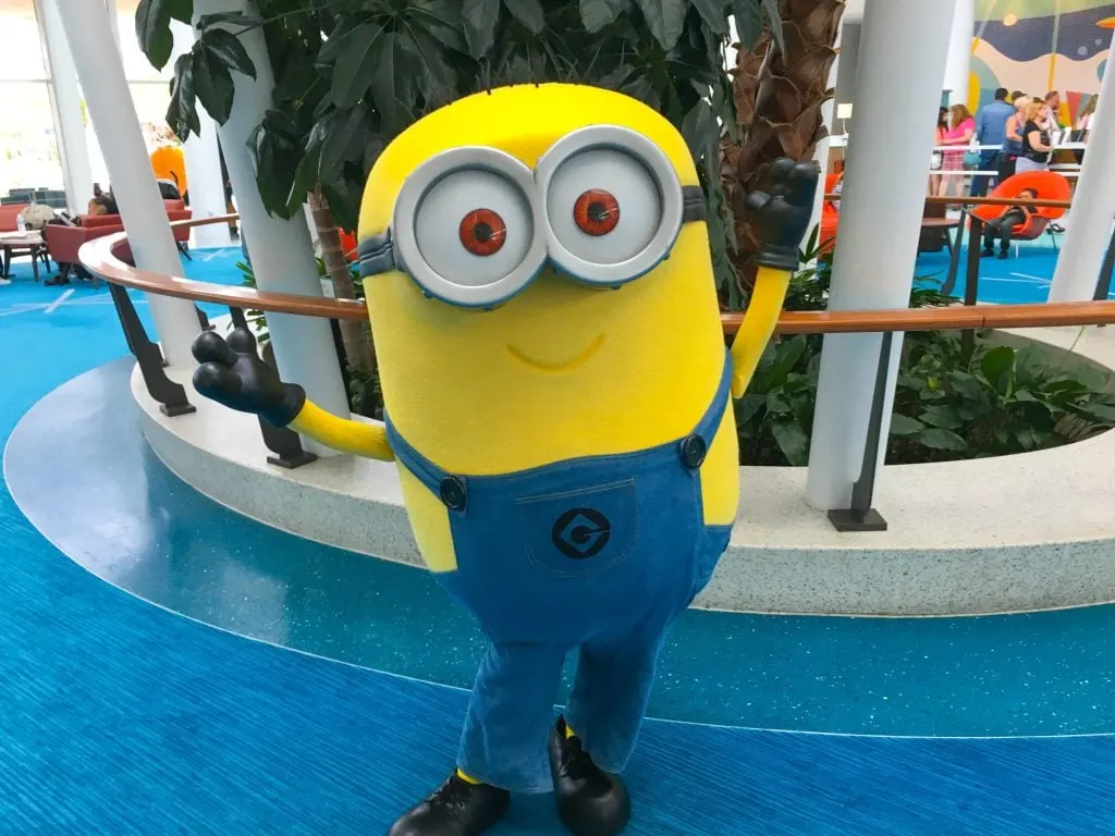 yellow Minion wearing blue denim overalls and glasses at Universal Orlando Resort