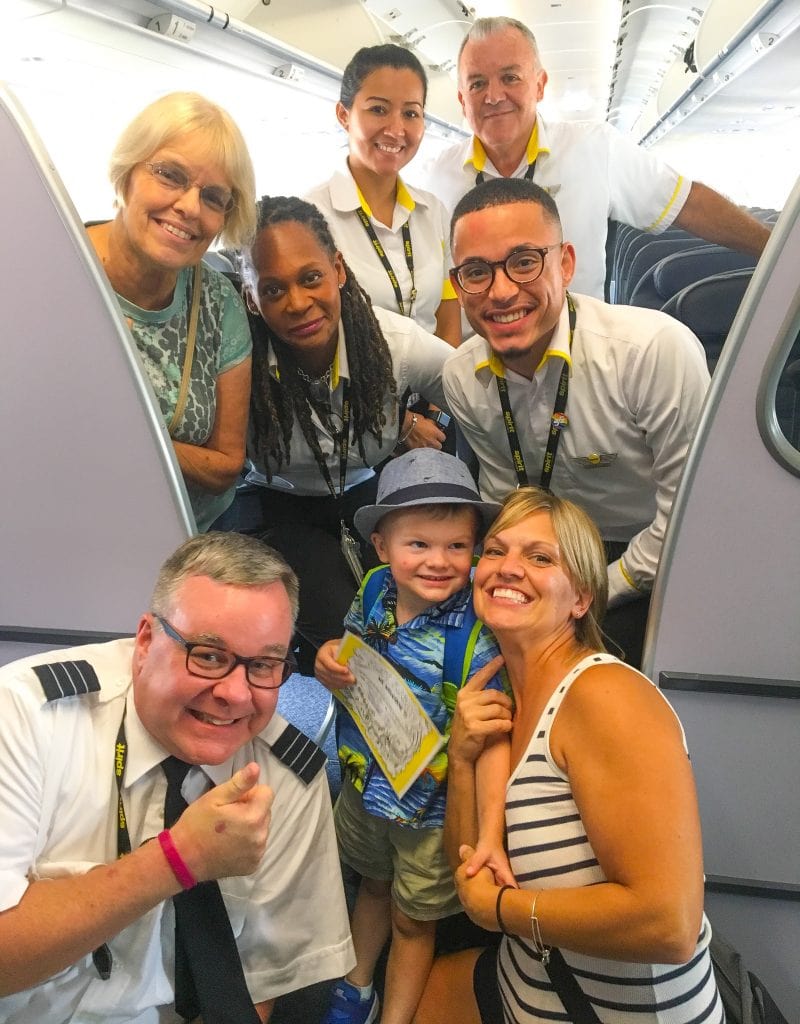 spirit airlines flight attendants with family on plane
