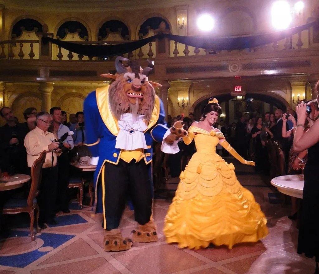 Belle and Beast dancing inside Be our Guest Restaurant Magic Kingdom