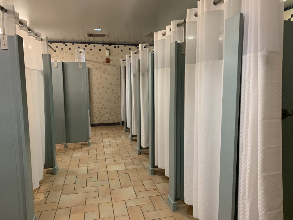 Shower stalls in bathroom Discovery Cove