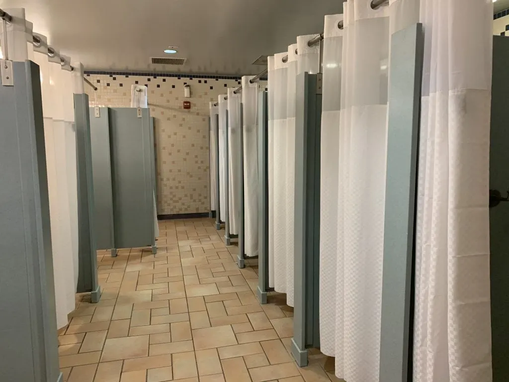 Shower stalls in bathroom Discovery Cove