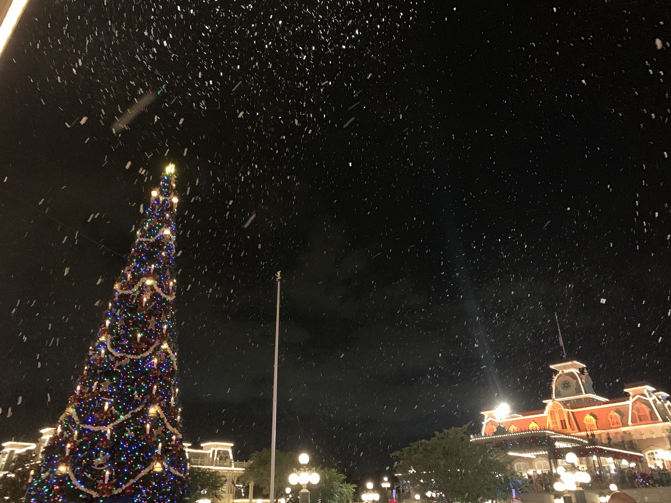 Snow over Main Street USA Mickey's Very Merry Christmas Party Magic Kingdom