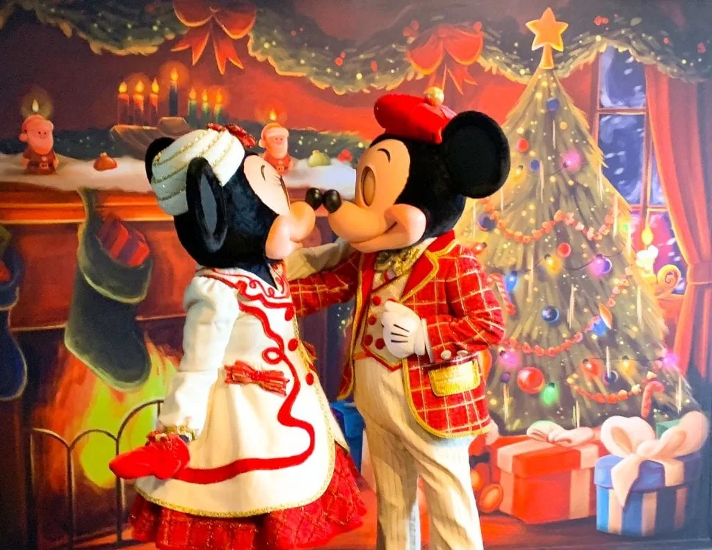 Mickey and Minnie Kissing in front of Christmas Tree