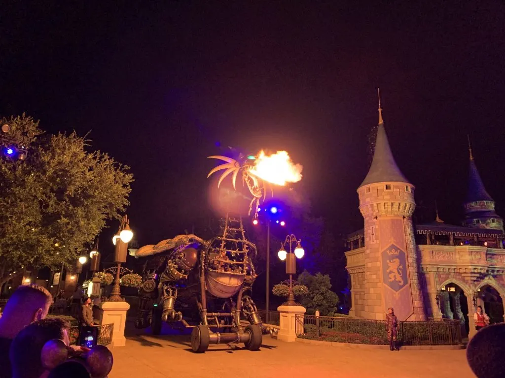 maleficent float breathing fire at night magic kingdom event