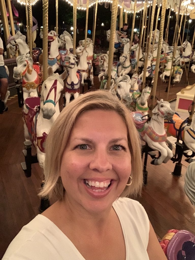 kim on magic kingdom carousel ride after hours event