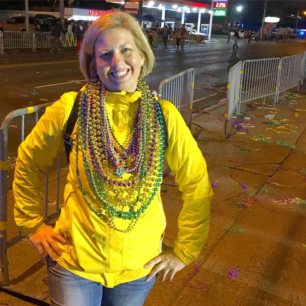 Kim wearing Mardi Gras beads Lake Charles Louisiana Parade