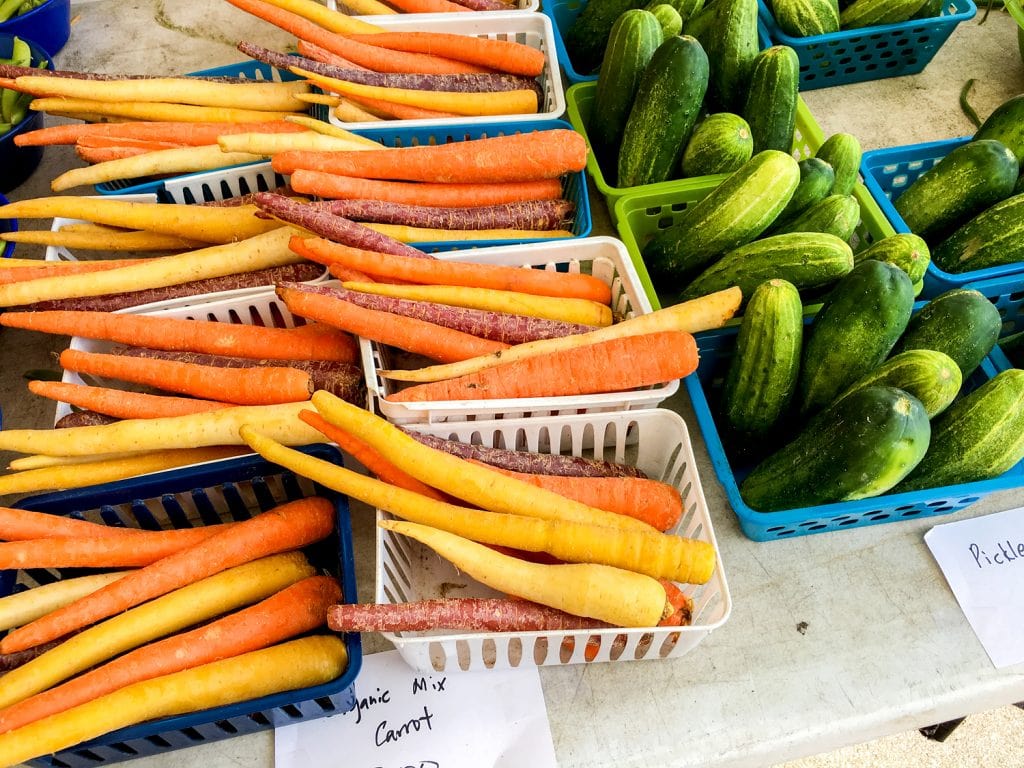 baskets of multicolored carrots Punta Gorda fl farmers market