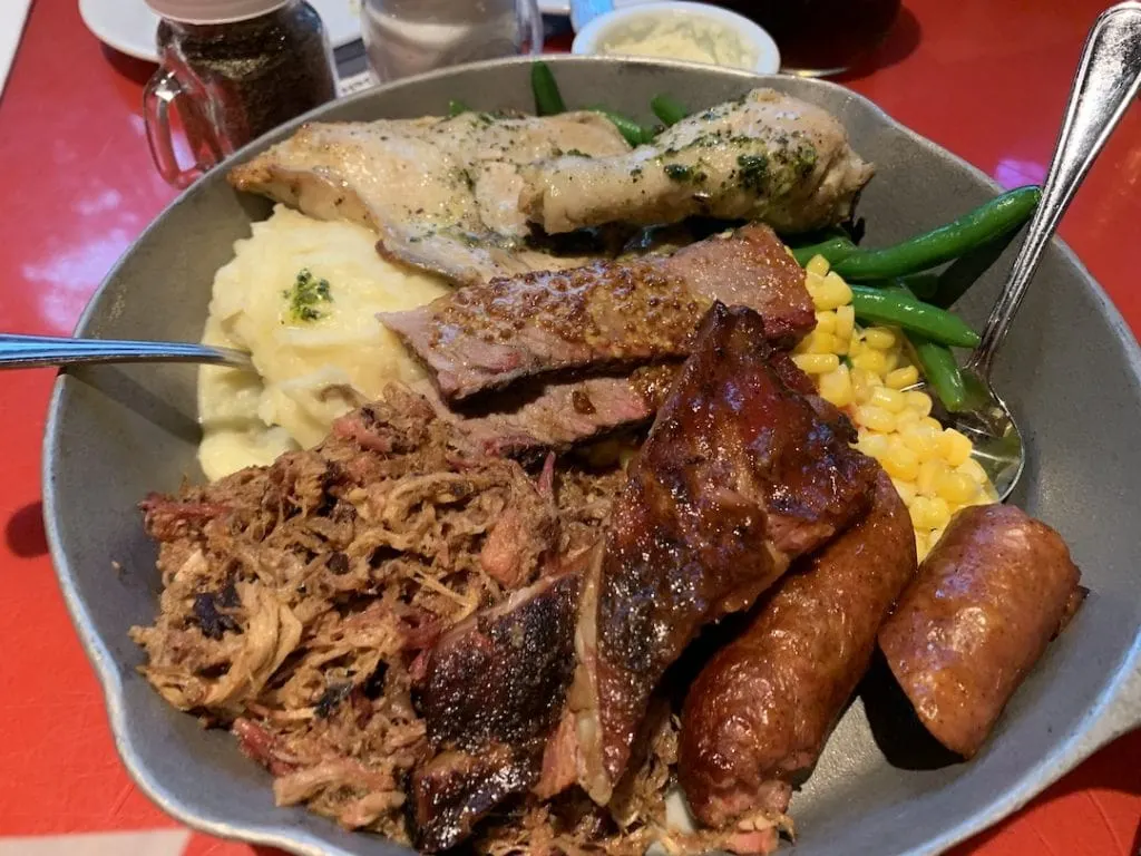 Meats and vegetables in iron skillet Disney Dining