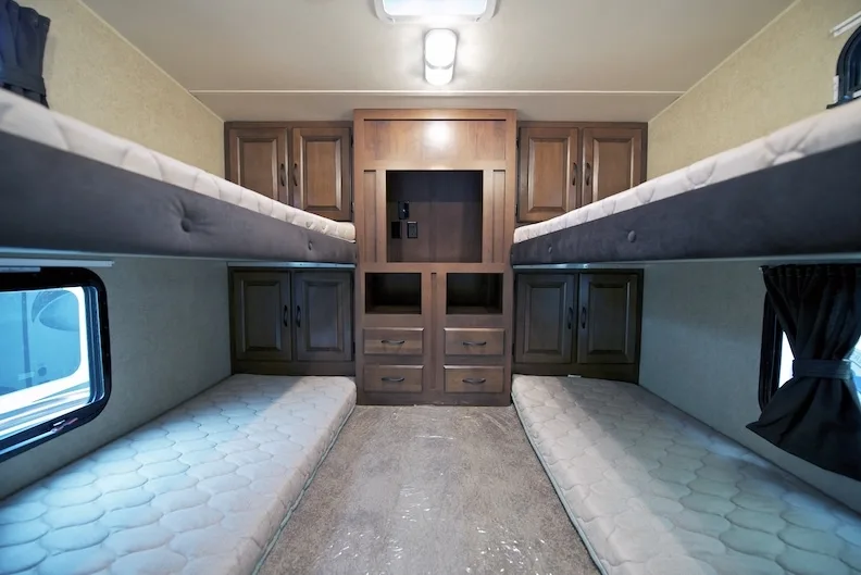 four bunk beds in an rv bedroom