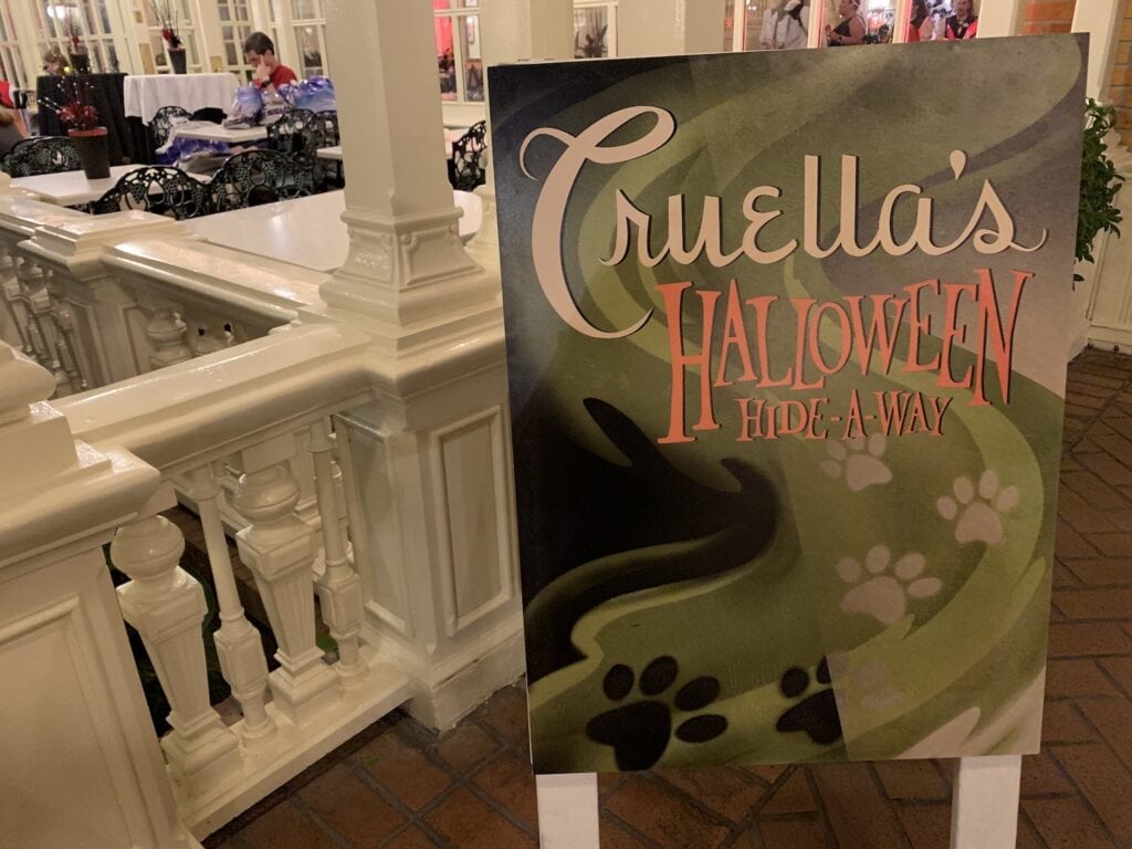 Cruellas Halloween Hideaway Party sign at magic kingdom
