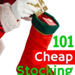 Santa Claus putting gift in stocking