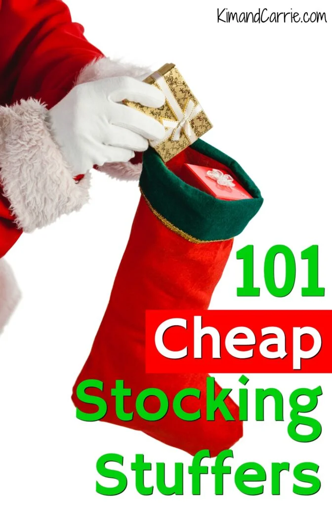 Santa Claus putting gift in stocking