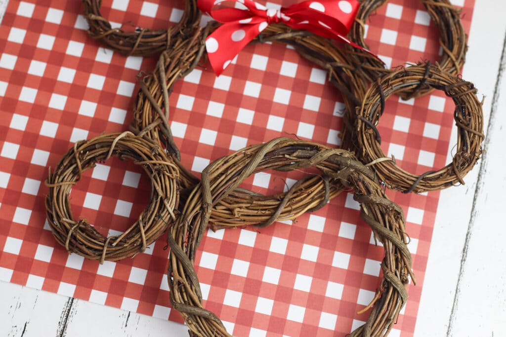 rustic Mickey Mouse wreaths made out of grapevine against red checkered background