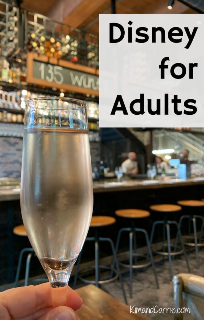 champagne glass held in front of Disney World bar
