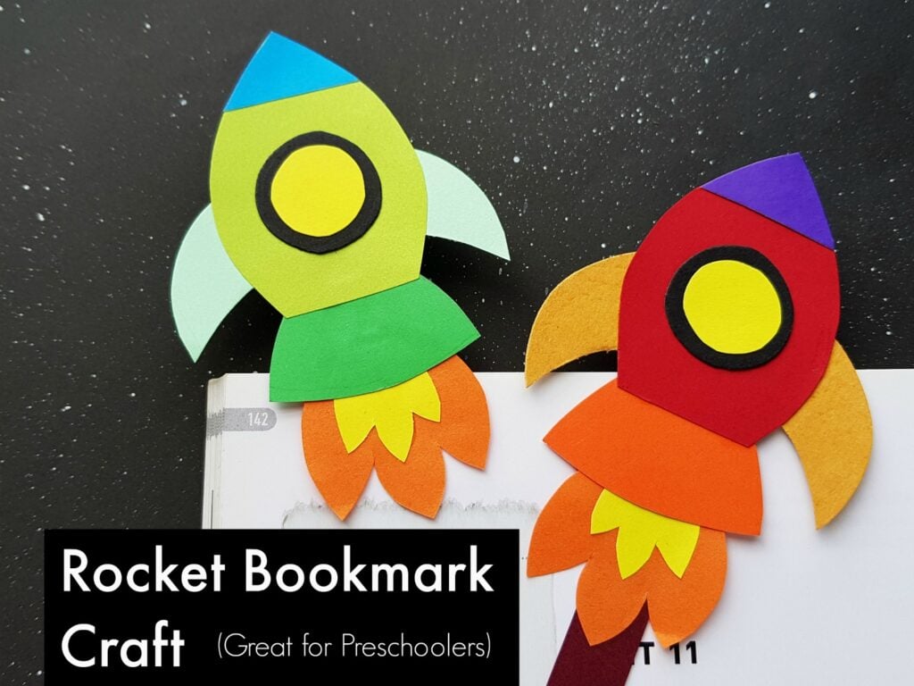 Paper rocket bookmarks laying on book