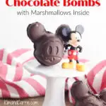 chocolate shaped Mickey Mouse heads next to plastic Mickey figurine