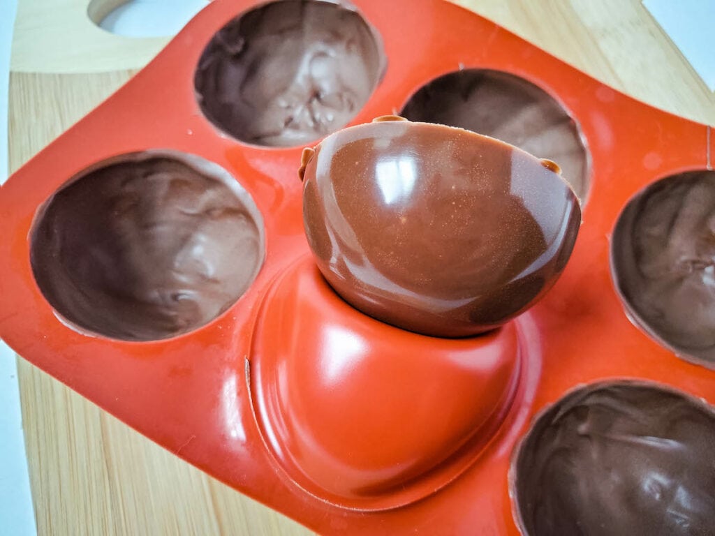 removing chocolate half spheres from silicone mold