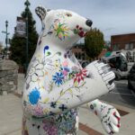 white bear painted with colorful patterns