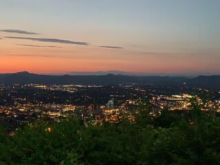 sunset view looking over city lights of Roanoke, VA