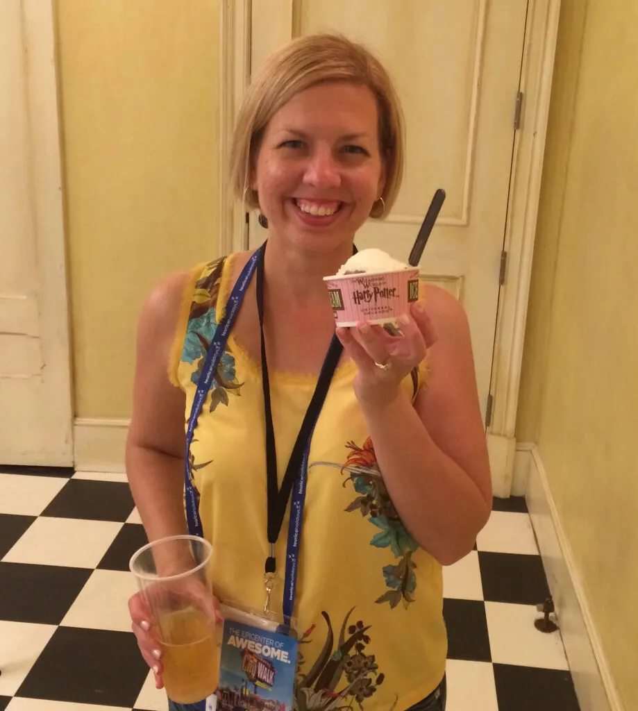 woman holding a cup of ice cream