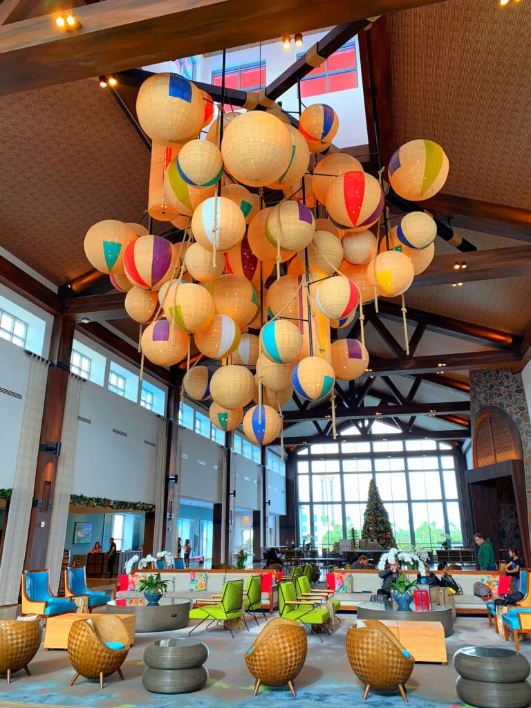 beach balls hanging from ceiling of Universal's Sapphire Falls Resort Hotel Lobby
