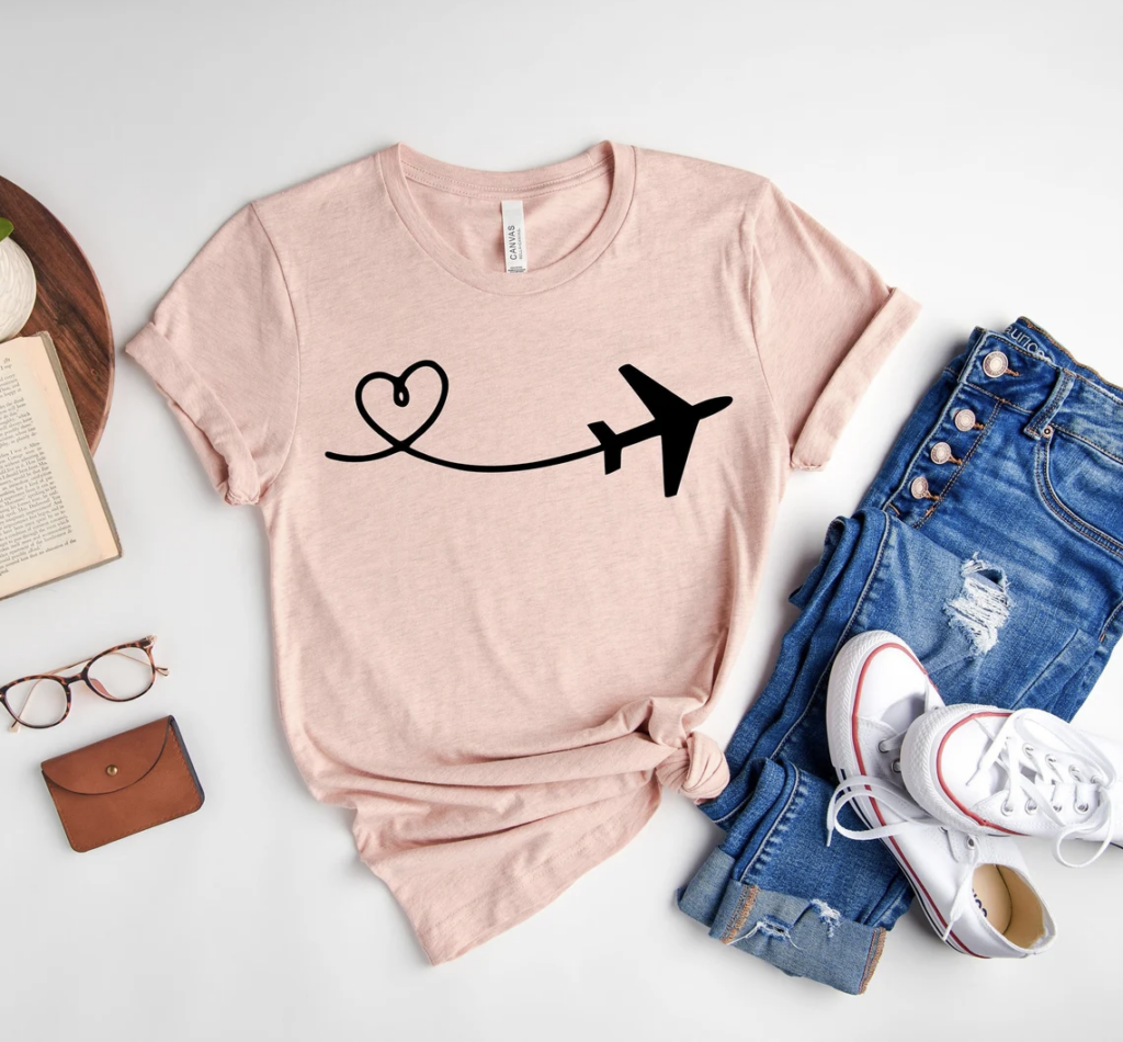 pink t-shirt with airplane and heart