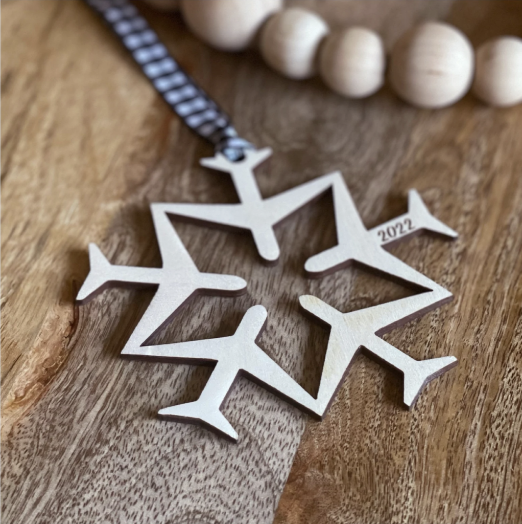 christmas snowflake ornament made from mini airplanes
