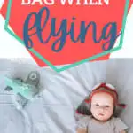 baby laying on blue blanket with airplane toy nearby