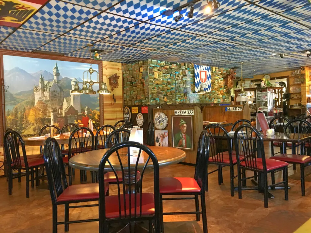 interior of haus Heidelberg German restaurant with blue and white checkerboard ceiling