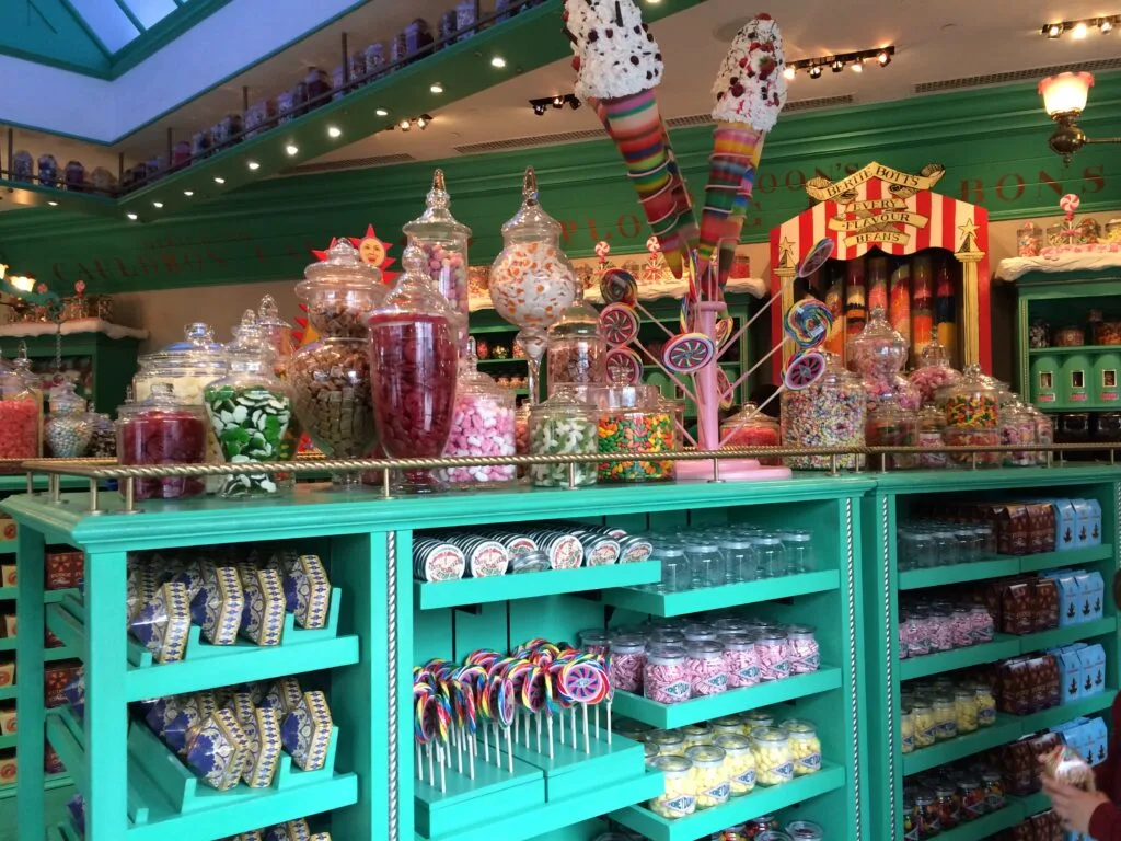 colorful shop with shelves of candy in Harry Potter world