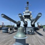 large artillery on the upper deck of the battleship nc